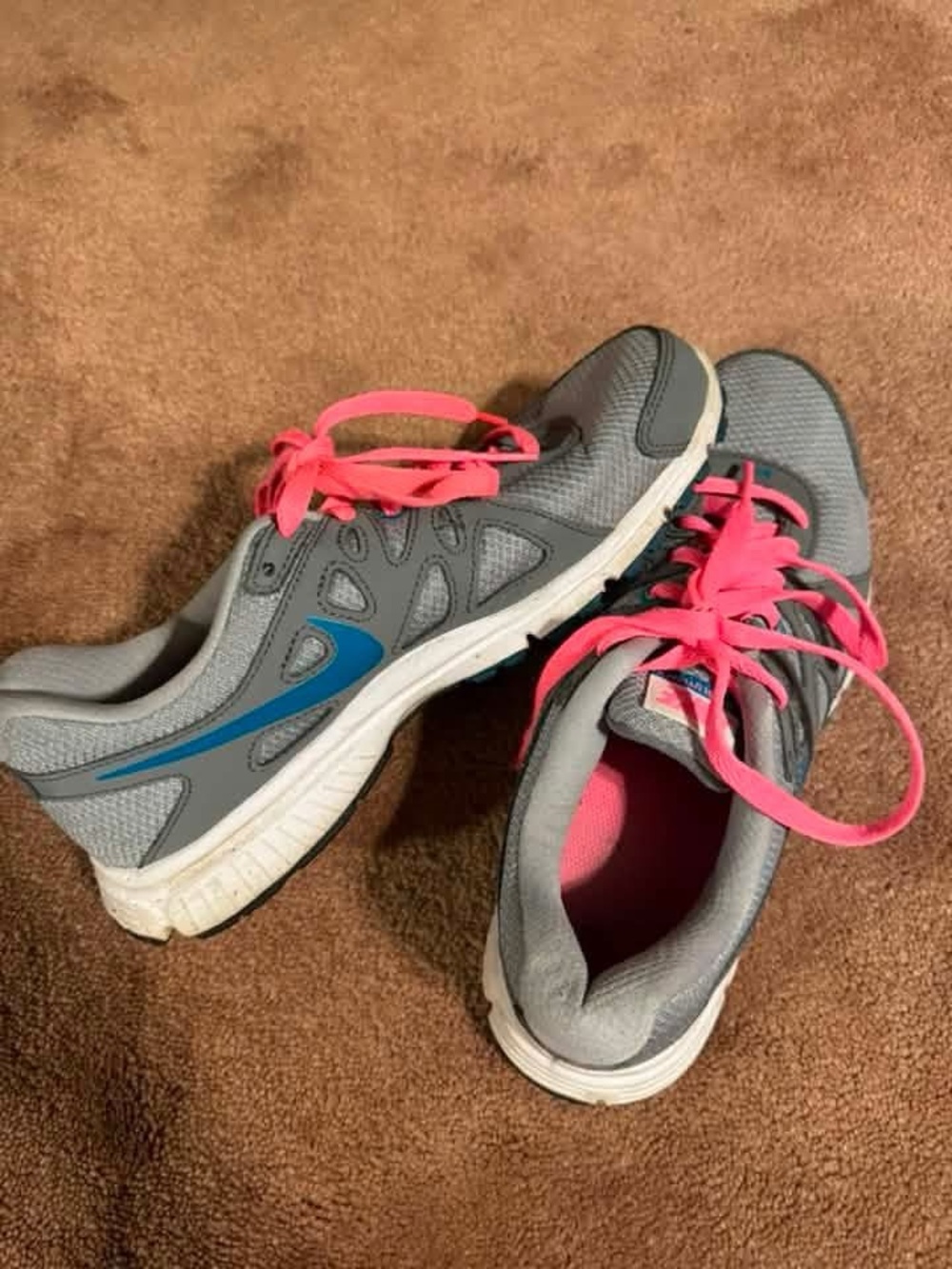 Women’s Gray Nike Running Sneakers with Pink Accents